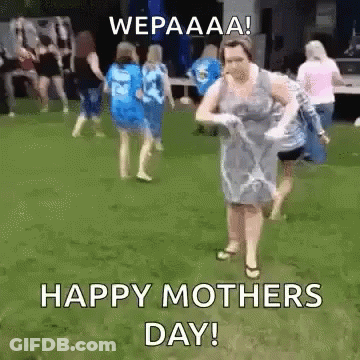 Woman Dancing In Grass With Group GIF