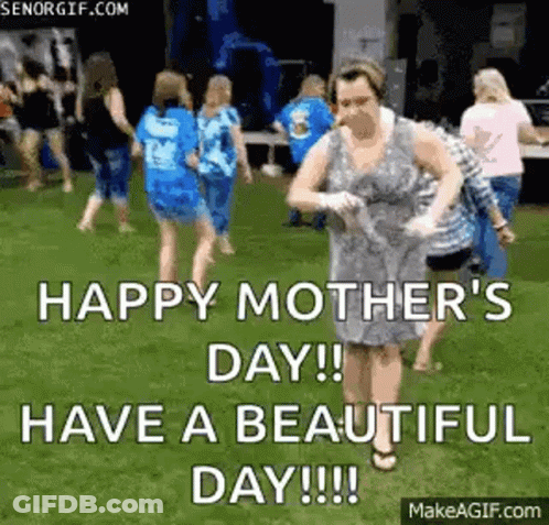 Woman Dancing In Grass With Group GIF
