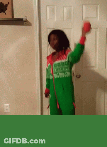 Woman Dancing In Green And Red Sweater GIF