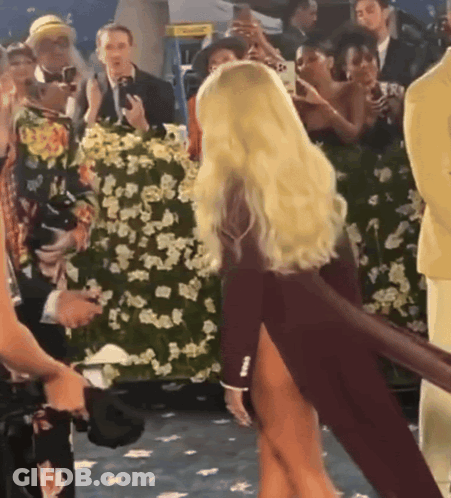 Woman Dancing In High Slit Dress GIF