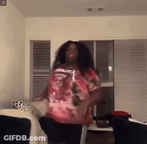Woman Dancing In Living Room Pink Shirt GIF