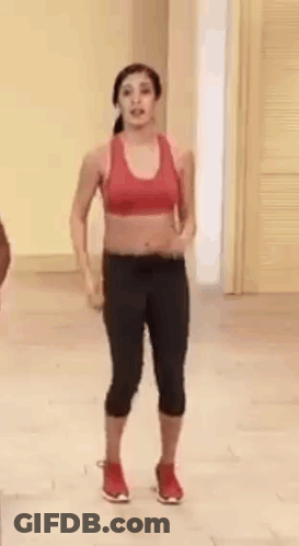 Woman Dancing In Red Sports Bra Black Leggings GIF
