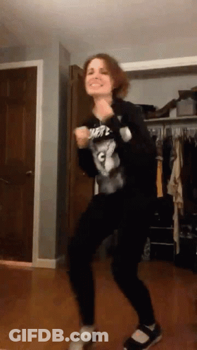 Woman Dancing In Room With C Shirt GIF
