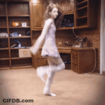 Woman Dancing In White Dress And Knee-High Socks GIF