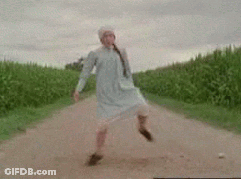Woman Dancing In White Dress GIF