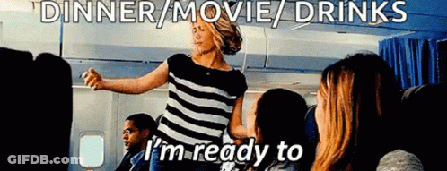 Woman Dancing On Airplane With Dinner Movie Drinks GIF