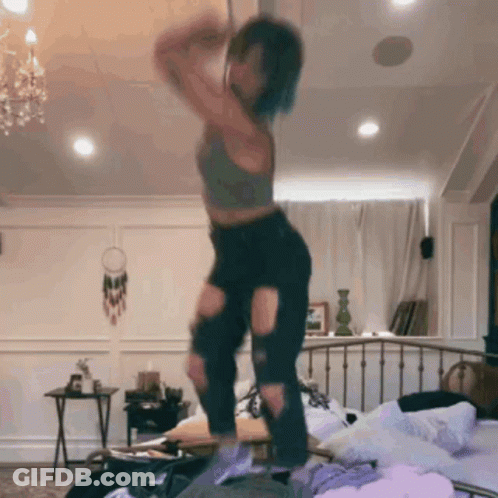 Woman Dancing On Pole In Bedroom GIF