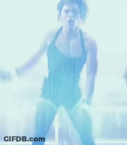 Woman Dancing On Stage In Front Of Crowd GIF