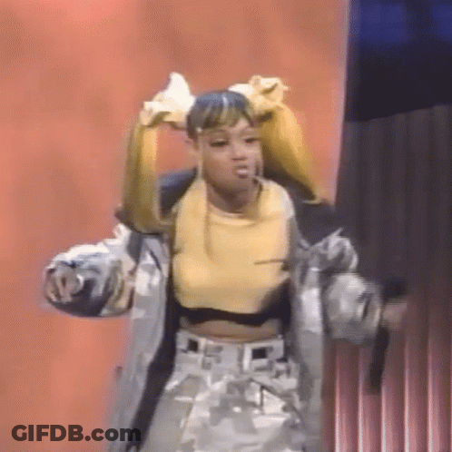 Woman Dancing On Stage In Yellow Top And Jacket GIF