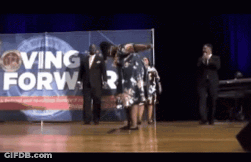Woman Dancing On Stage Saying Moving Forward GIF
