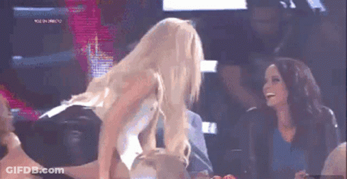 Woman Dancing On Stage While Another Watches GIF