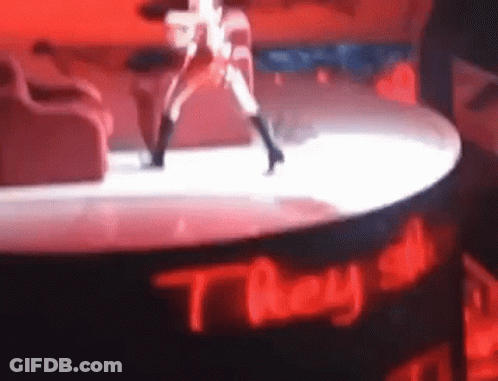 Woman Dancing On Stage With They All Sign GIF