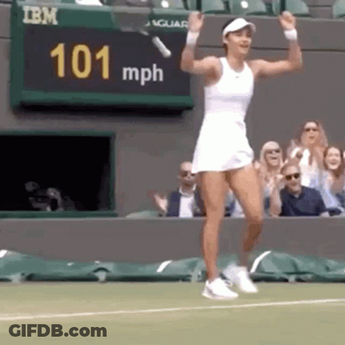 Woman Dancing On Tennis Court Holding Racket GIF