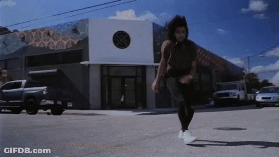 Woman Dancing On The Road GIF