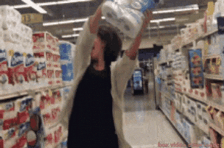 Woman Dancing While Holding Toilet Paper GIF