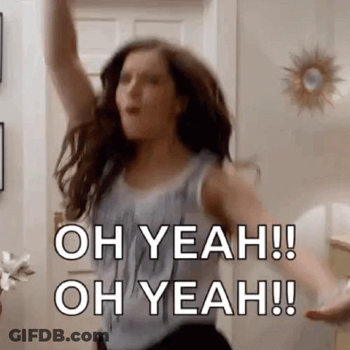 Woman Dancing With Arms In Air Saying Oh Yeah GIF