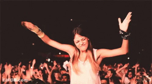 Woman Dancing With Arms Outstretched GIF