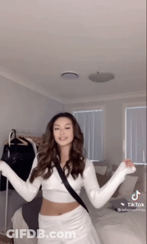 Woman Dancing With Arms Outstretched GIF