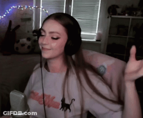 Woman Dancing With Cat Shirt And Headphones Microphone GIF