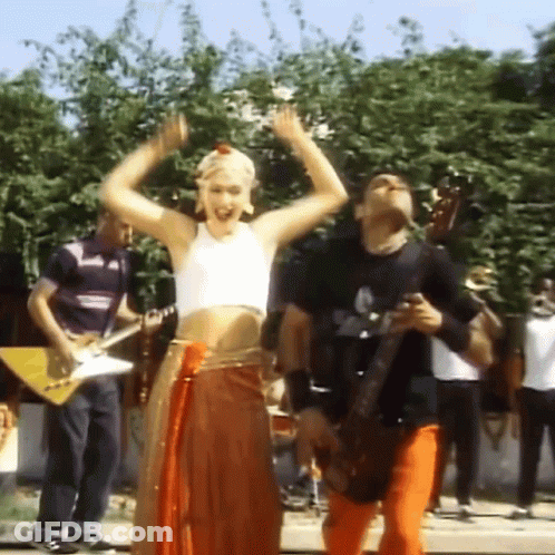 Woman Dancing With Guitar Player GIF