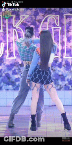 Woman Dancing With Man In Plaid Shirt GIF