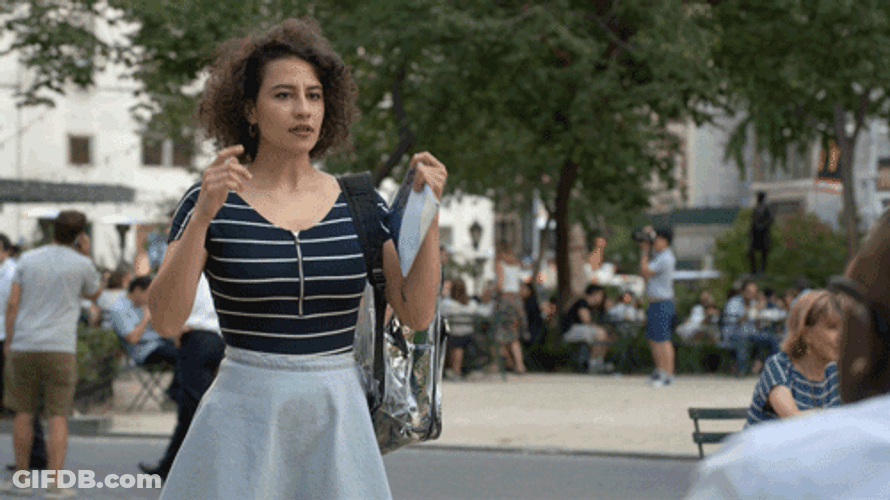 Woman Doing Finger Guns GIF