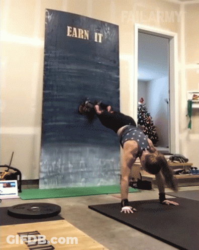 Woman Doing Handstand Sign Saying Earn It GIF