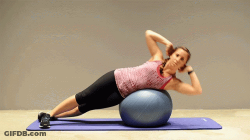Woman Doing Plank On Blue Exercise Ball GIF