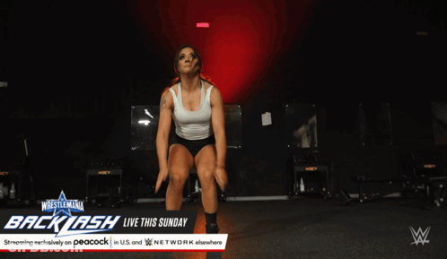 Woman Doing Push Ups In Front Of Backlash Sign GIF