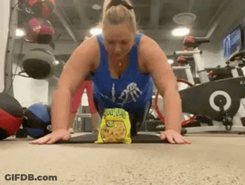 Woman Doing Push Ups With Chips GIF