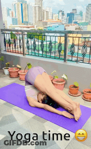 Woman Doing Yoga On Purple Mat Saying Yoga Time GIF