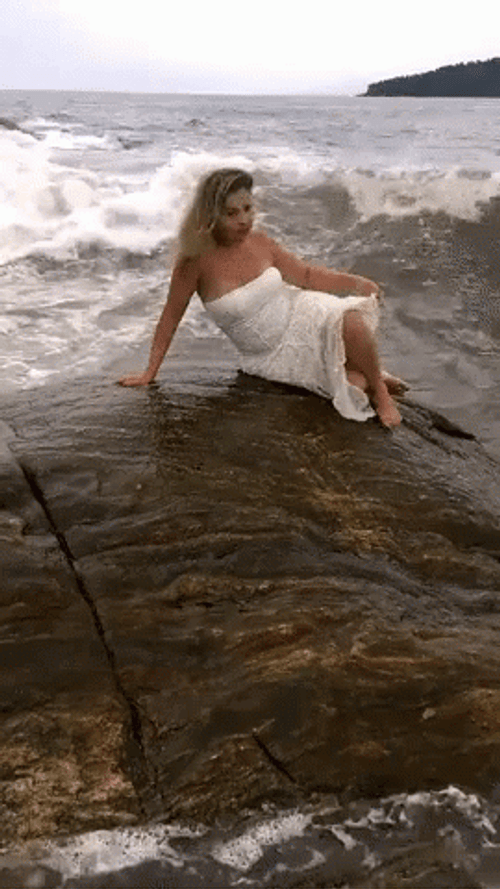 Woman Dragged By Strong Wave Funny Beach GIF