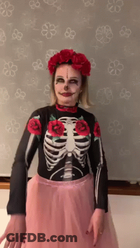 Woman Dressed As Day Of The Dead Skeleton GIF