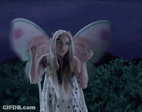 Woman Dressed As Fairy With Wings On Head GIF