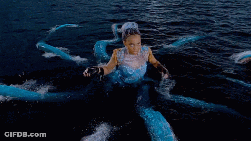 Woman Dressed As Octopus Swimming GIF