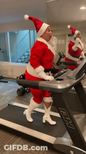 Woman Dressed As Santa Claus On BH Treadmill GIF