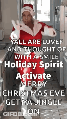 Woman Dressed As Santa In Kitchen GIF