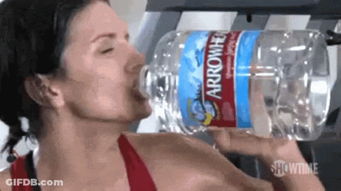 Woman Drinking Arrowhead Water GIF