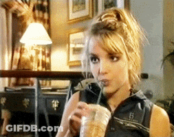 Woman Drinking Beverage Through Straw GIF