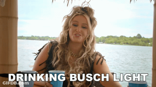 Woman Drinking Busch Light By Water GIF