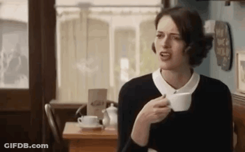 Woman Drinking Coffee Making Funny Face GIF