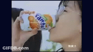 Woman Drinking Fanta Orange Soda GIF
