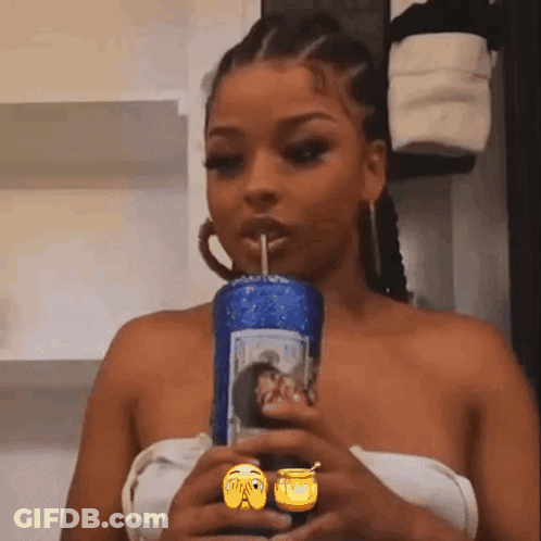 Woman Drinking From Blue Cup With Smiley Face GIF
