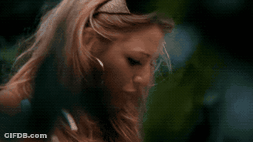 Woman Drinking From Bottle With Tongue Out GIF
