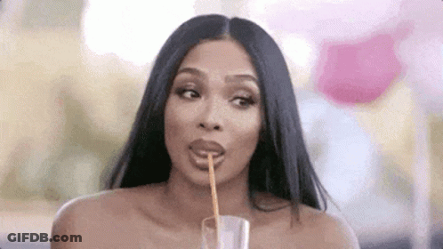 Woman Drinking From Glass With Straw GIF