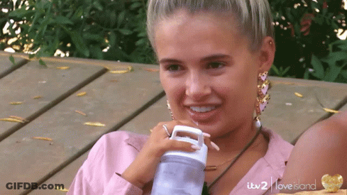 Woman Drinking From Itv 2 Love Island Bottle GIF