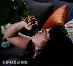 Woman Drinking From Jameson Bottle GIF