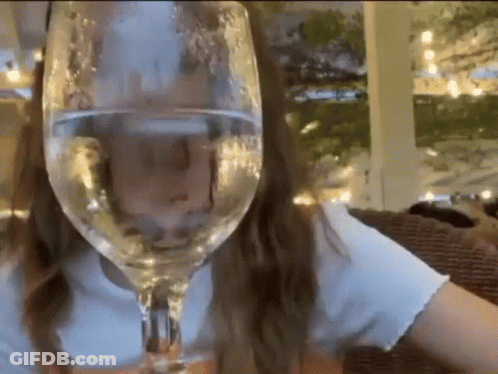 Woman Drinking From Large Wine Glass GIF