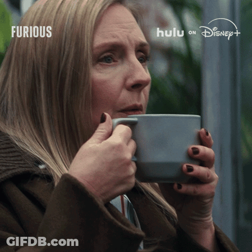 Woman Drinking From Mug Saying Furious GIF