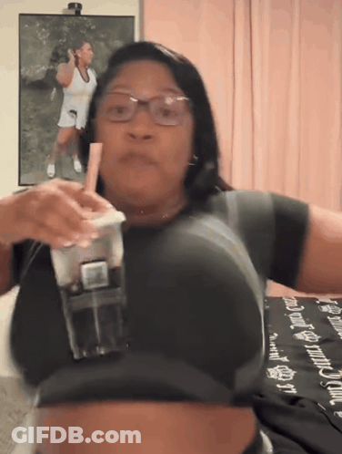 Woman Drinking From Plastic Cup With Pink Straw GIF